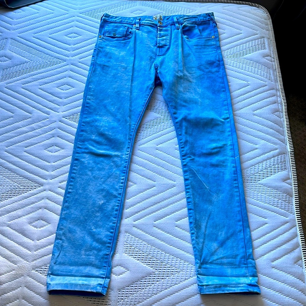 Wash off light blue jeans for men